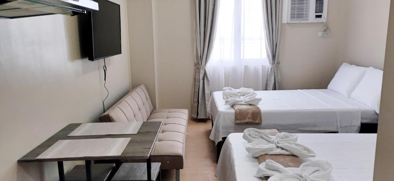 Sunvida Tower Stays Across Sm City Cebu Esterno foto