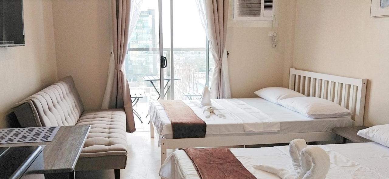 Sunvida Tower Stays Across Sm City Cebu Esterno foto